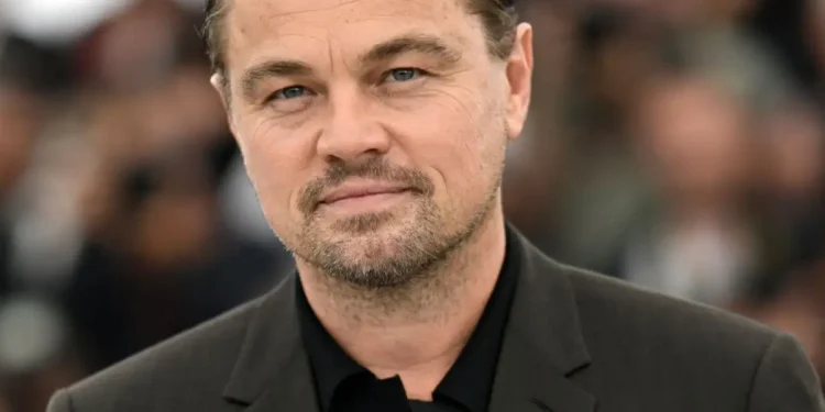 Leonardo DiCaprio Hides His Face in New Photos with and Younger Girlfriend During Their First Hollywood Outing