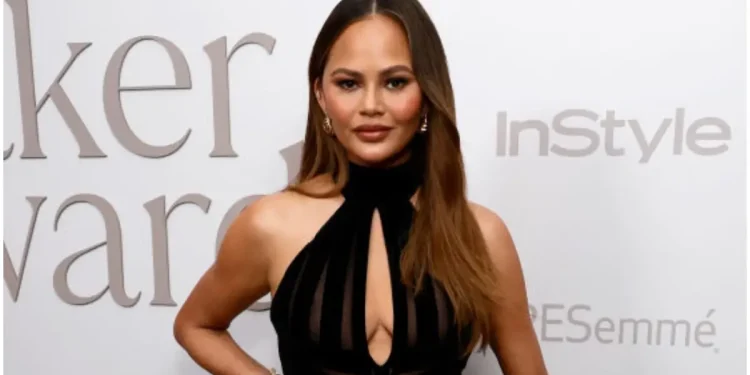 Chrissy Teigen Flaunts a Sultry Dress, Yet One Look at Her Feet Stops Fans Cold