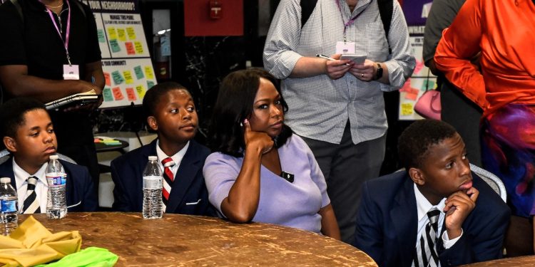 Janeese Lewis George tours several wards on education