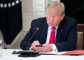 Trump Takes Credit for G7 Deal, Then a Leaked Photo Ignites Questions About What Was Happening Behind His Screen